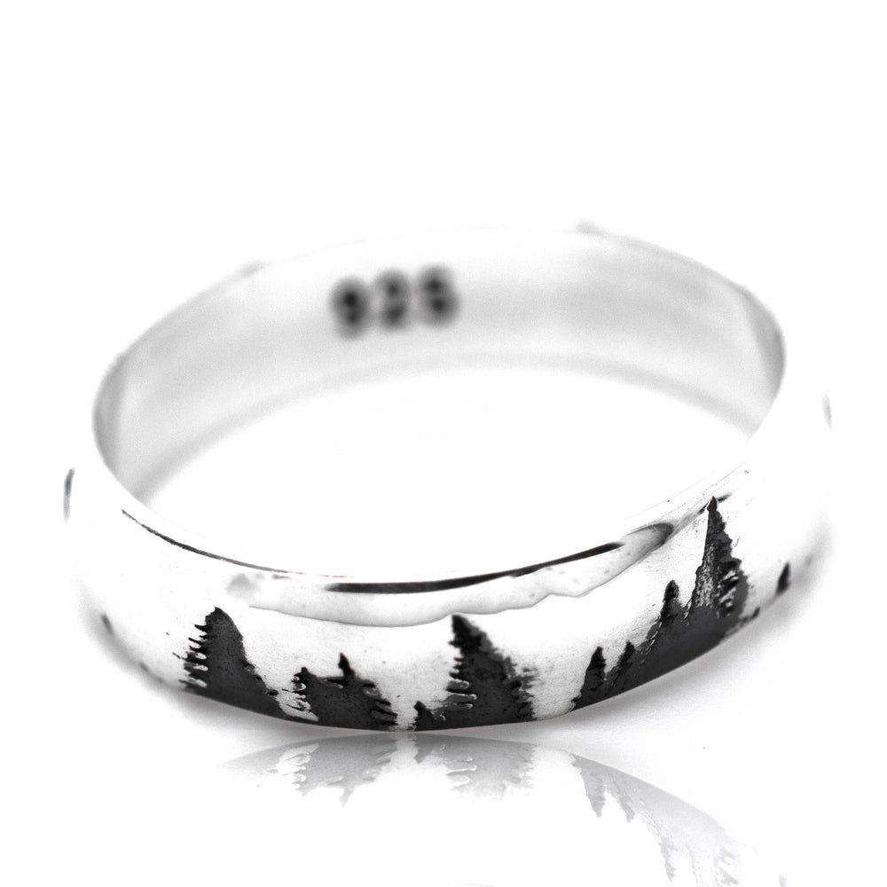 
                  
                    A Sleek Tree Band with a black and white image of pine trees, showcasing the beauty of nature.
                  
                