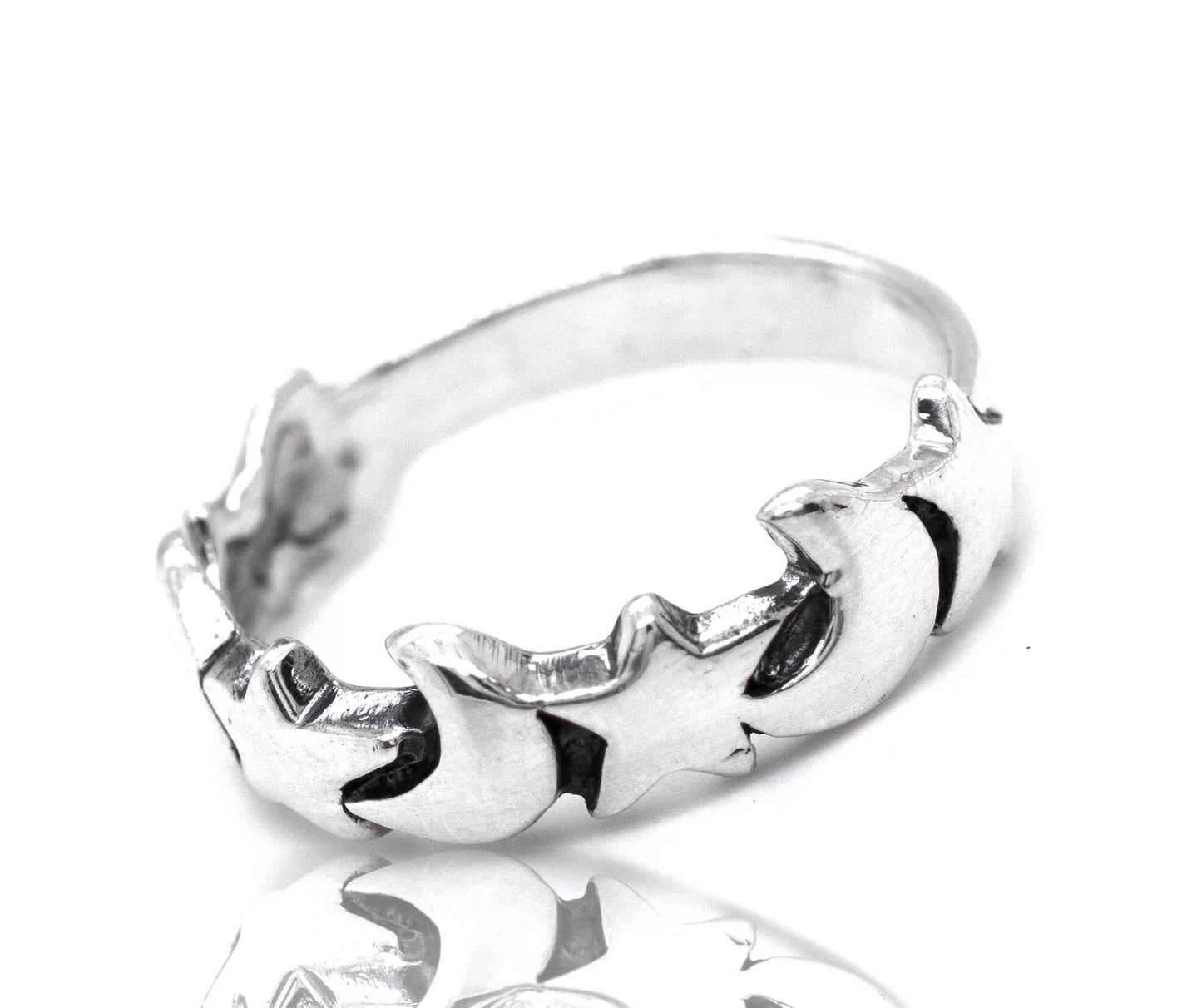 A Super Silver Crescent Moon And Star Band with a star design and crescent moons on it.