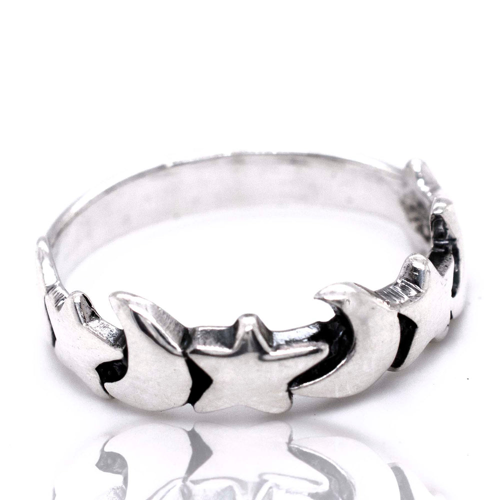 
                  
                    A Crescent Moon And Star Band with a star design from Super Silver.
                  
                