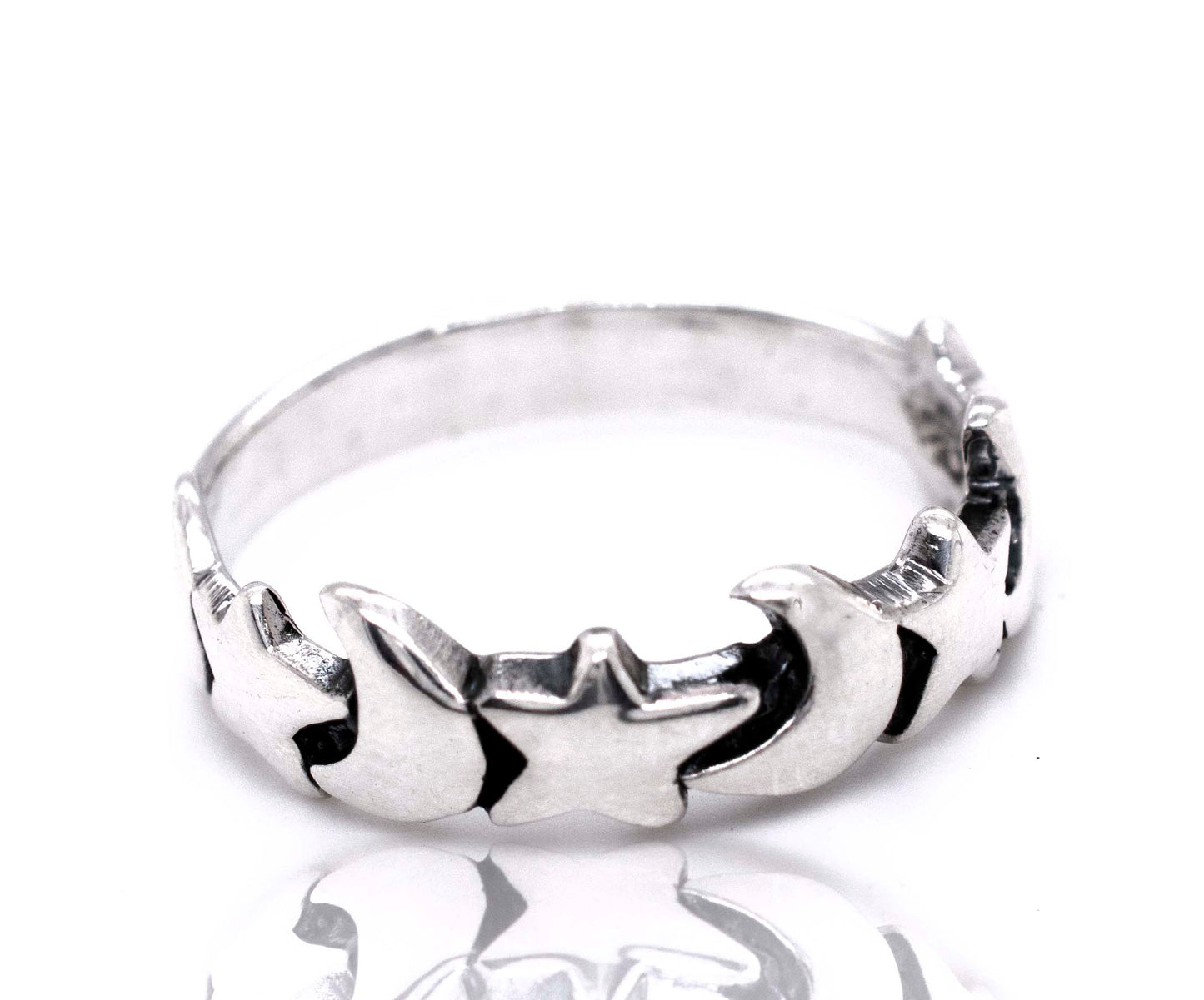 
                  
                    A Crescent Moon And Star Band with a star design from Super Silver.
                  
                