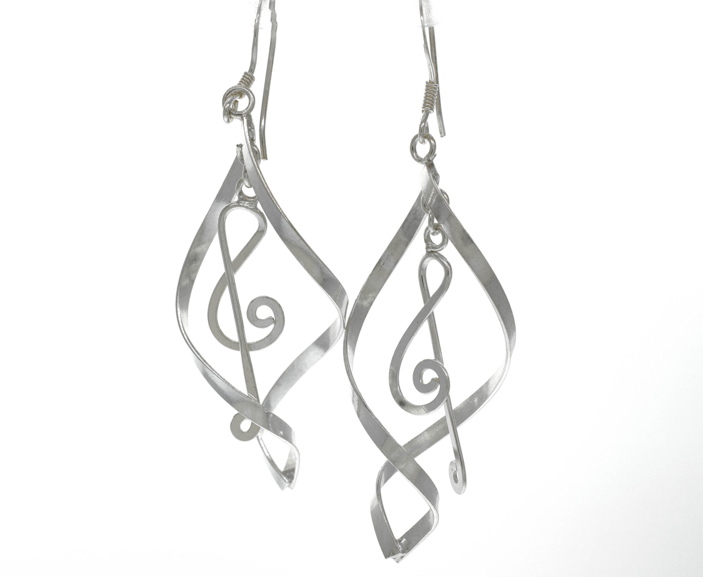 
                  
                    A pair of Striking Treble Clef earrings in .925 Sterling Silver by Super Silver.
                  
                
