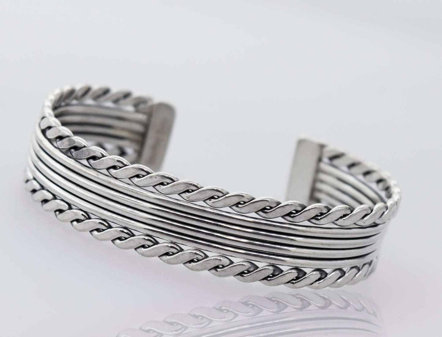 A Native American Handmade Thick Silver Cuff with a Rope Border by Super Silver, a statement piece.