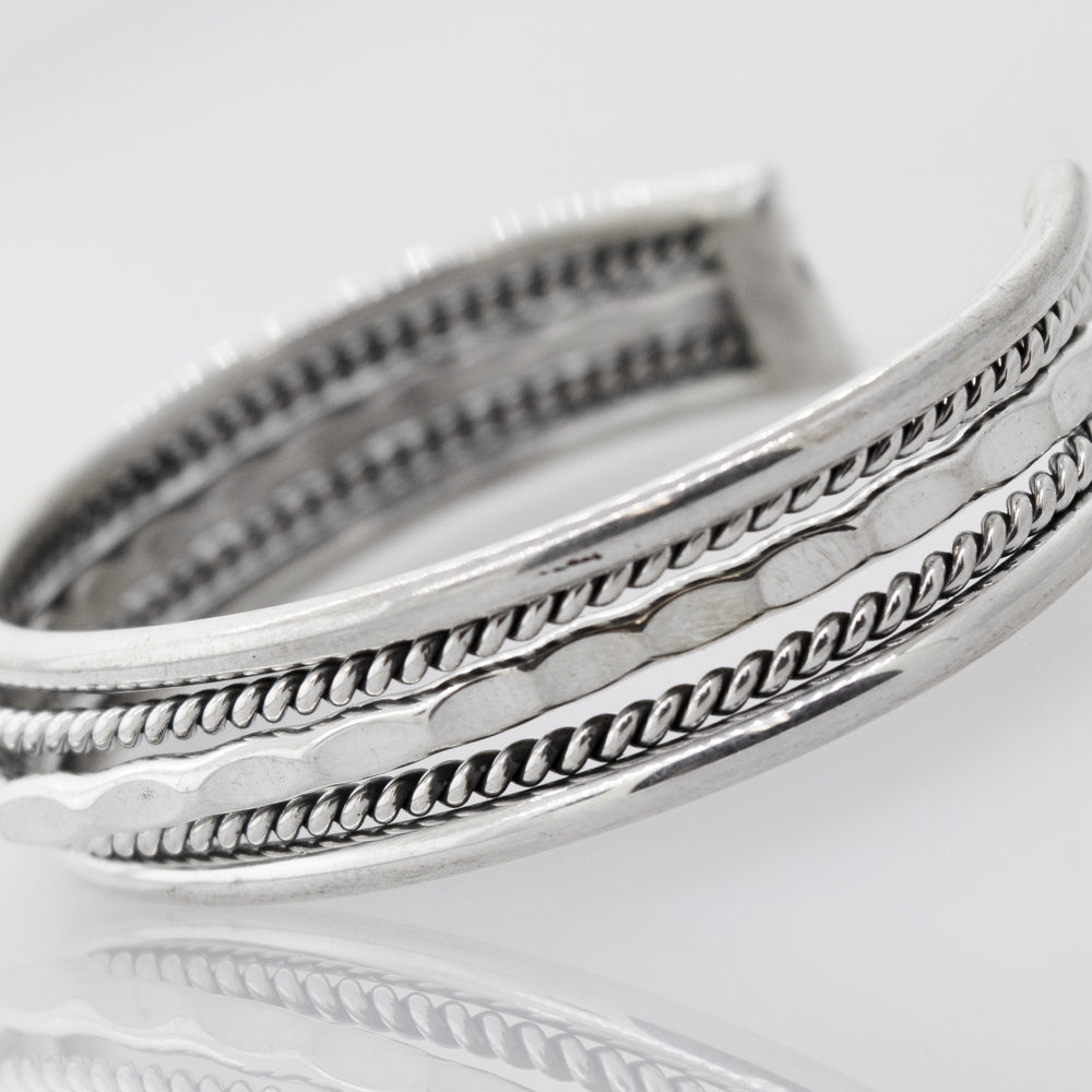
                  
                    Stay ahead in the fashion game with this exquisite Native American Handmade Intricate Silver Cuff cuff bracelet from our detailed cuff collection. The intricate braided design adds a touch of elegance to any ensemble. Shop now from Super Silver.
                  
                