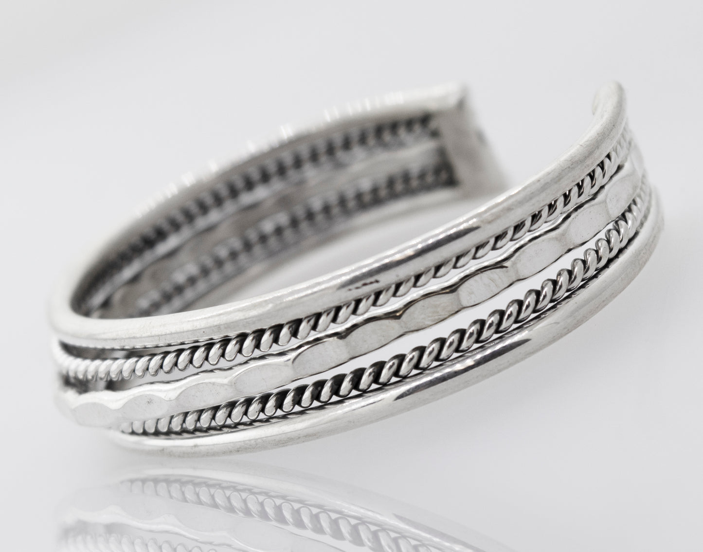 
                  
                    Stay ahead in the fashion game with this exquisite Native American Handmade Intricate Silver Cuff cuff bracelet from our detailed cuff collection. The intricate braided design adds a touch of elegance to any ensemble. Shop now from Super Silver.
                  
                