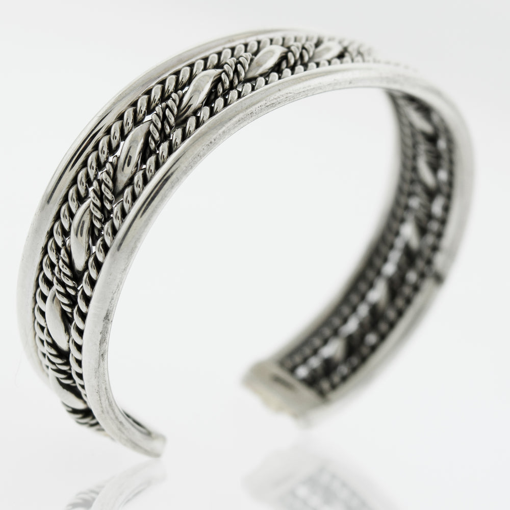 A bold piece of jewelry, the Native American Handmade Intricate Silver Cuff from Super Silver features a stylish braided design that is sure to turn heads.
