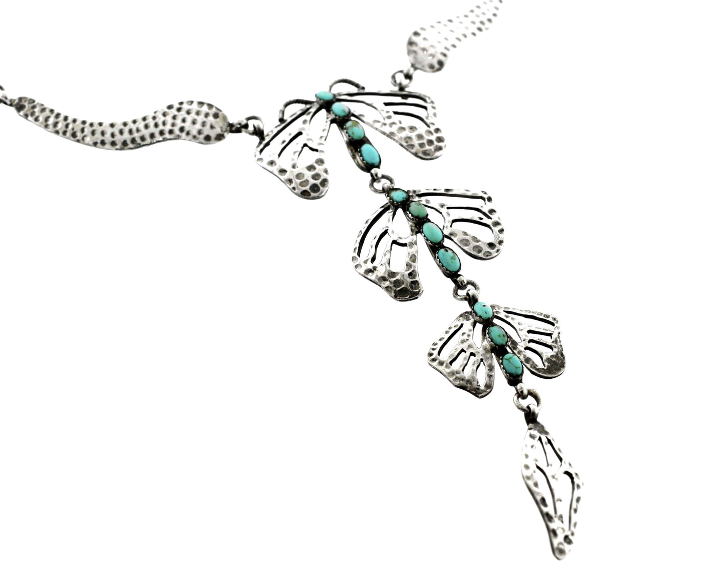 
                  
                    A handmade Turquoise Dragonfly Necklace And Earring Set with Super Silver dragonfly charm and leaf accents.
                  
                