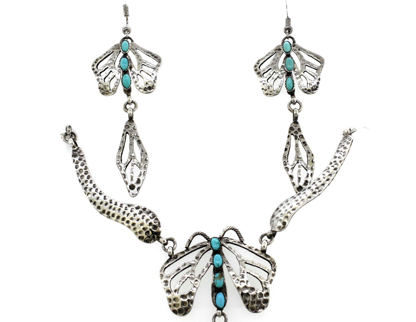 
                  
                    A Super Silver Handmade Turquoise Dragonfly Necklace And Earring Set with turquoise accents.
                  
                