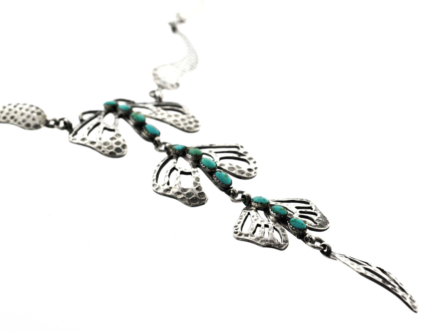 
                  
                    A Super Silver Handmade Turquoise Dragonfly Necklace And Earring Set adorned with turquoise beads and leaves.
                  
                