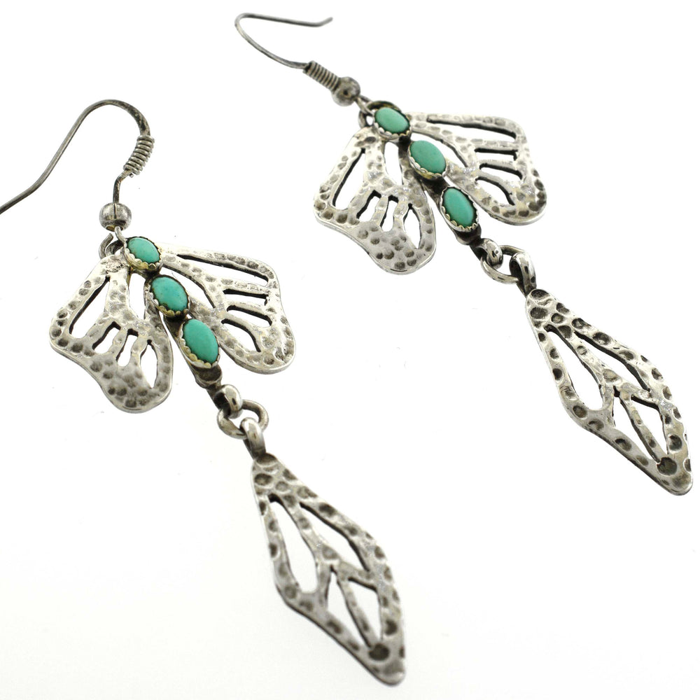 
                  
                    A pair of Super Silver earrings with handmade Turquoise Dragonfly Necklace And Earring Set.
                  
                