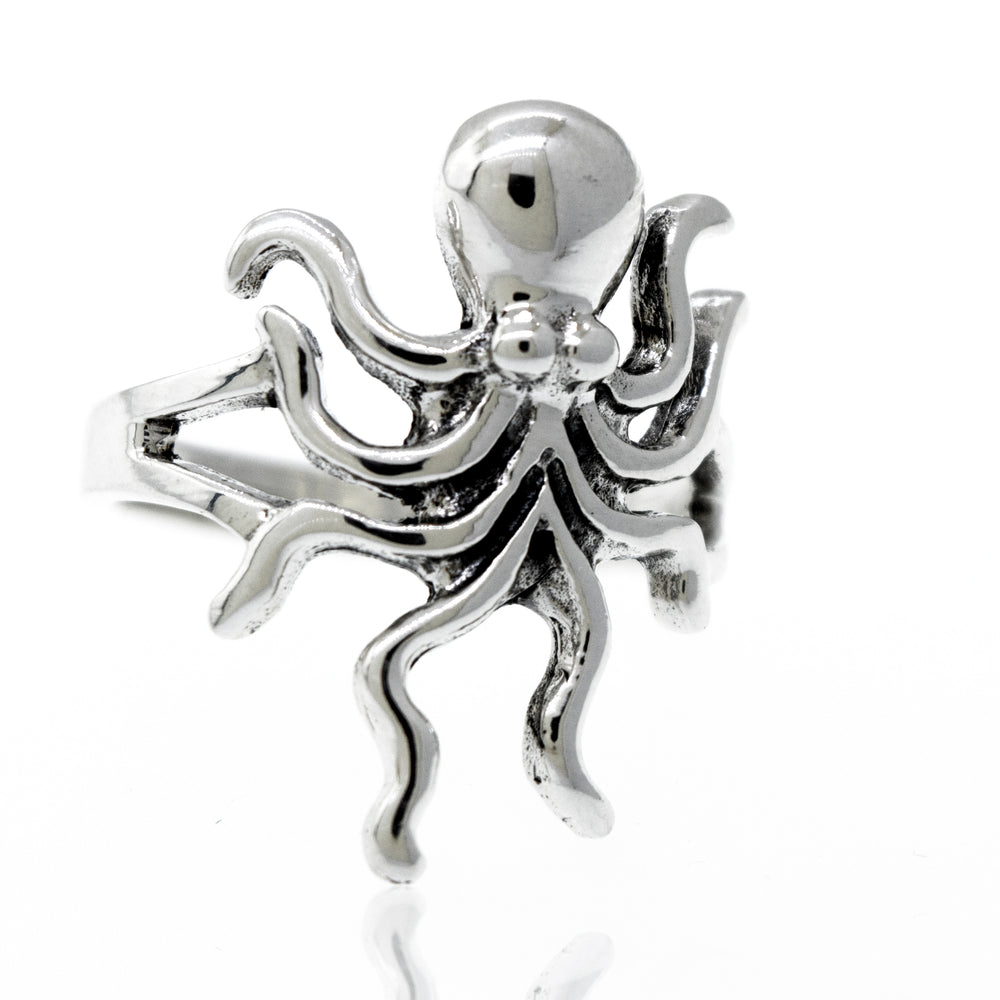 A high polish Super Silver sterling silver octopus ring on a white background.