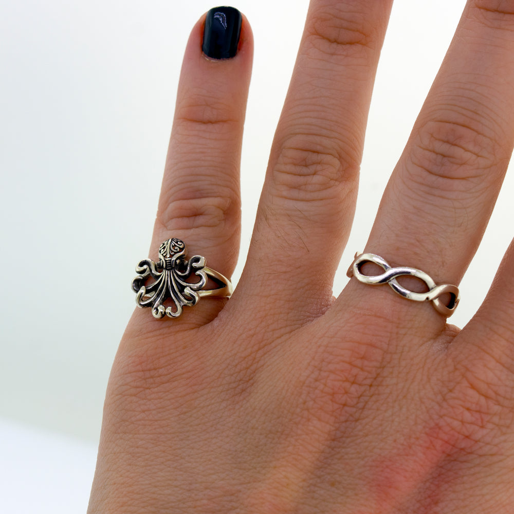 
                  
                    A handcrafted Brilliant Octopus Ring made of Super Silver.
                  
                