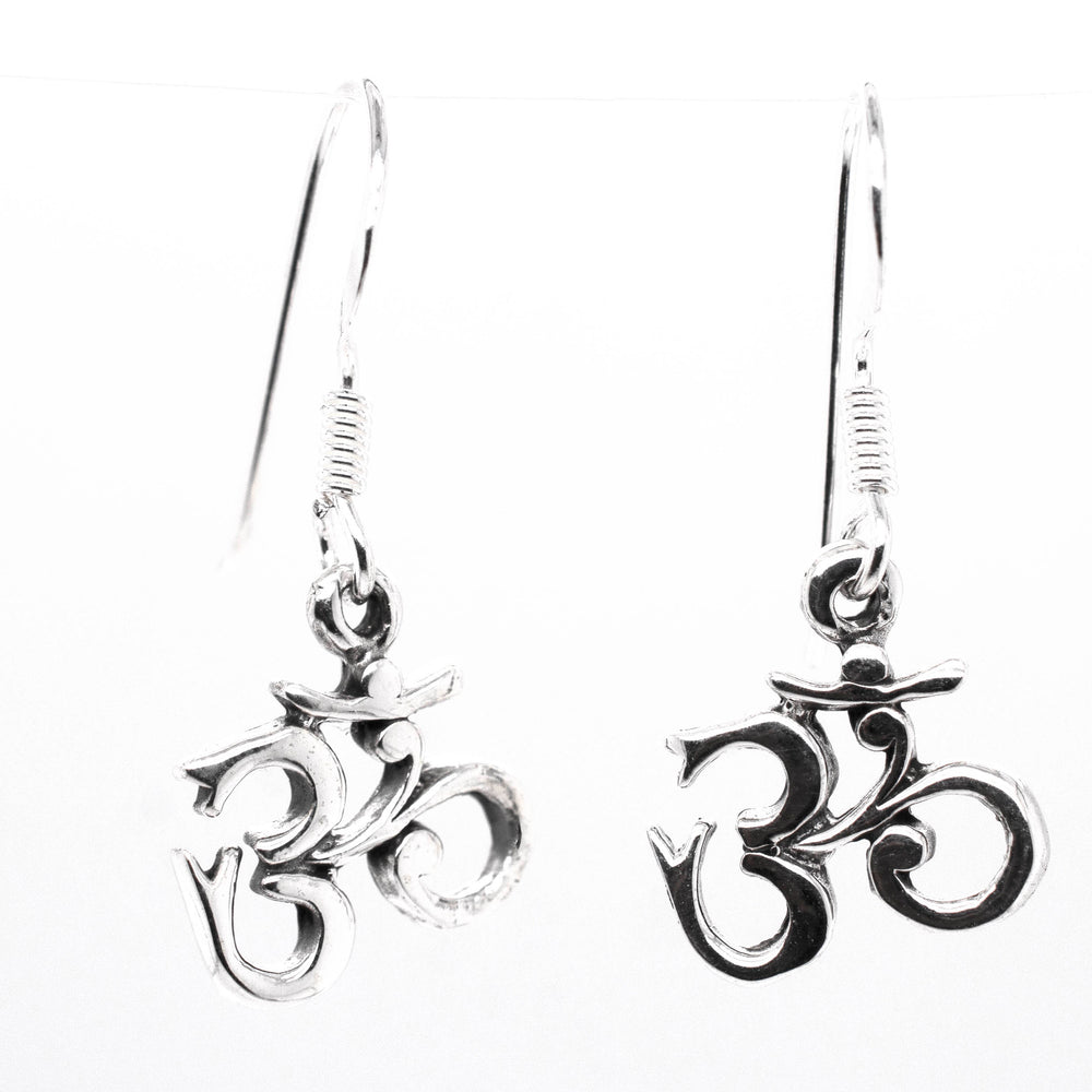 
                  
                    Seek fulfillment with these Dainty "Om" Earrings from Super Silver.
                  
                