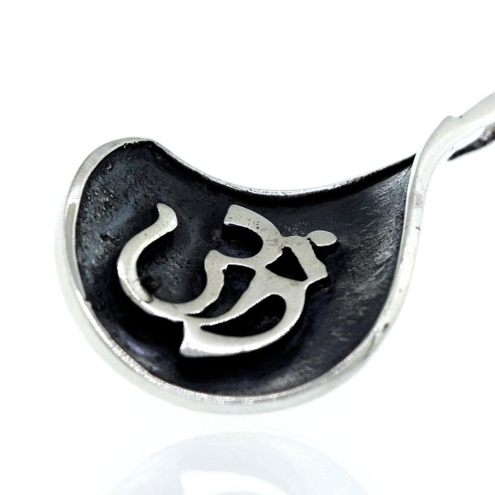 
                  
                    A Super Silver Om Symbol Pendant.
                  
                