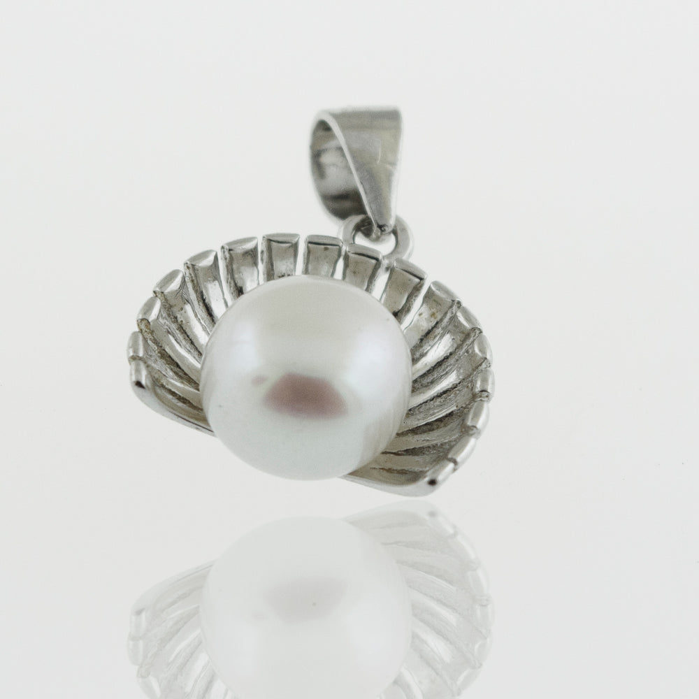 A petite Super Silver pearl pendant on a white background.