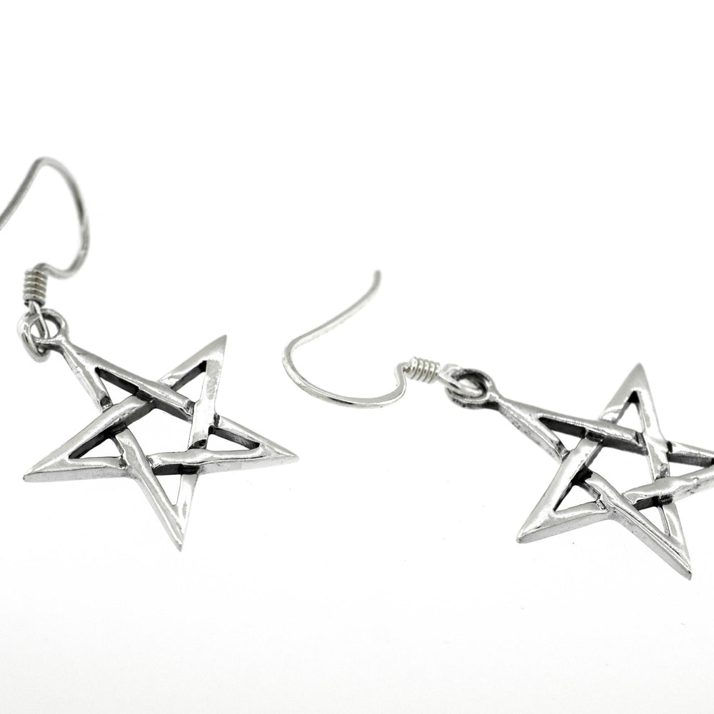 A pair of Super Silver sterling silver pentagram earrings on a white background.