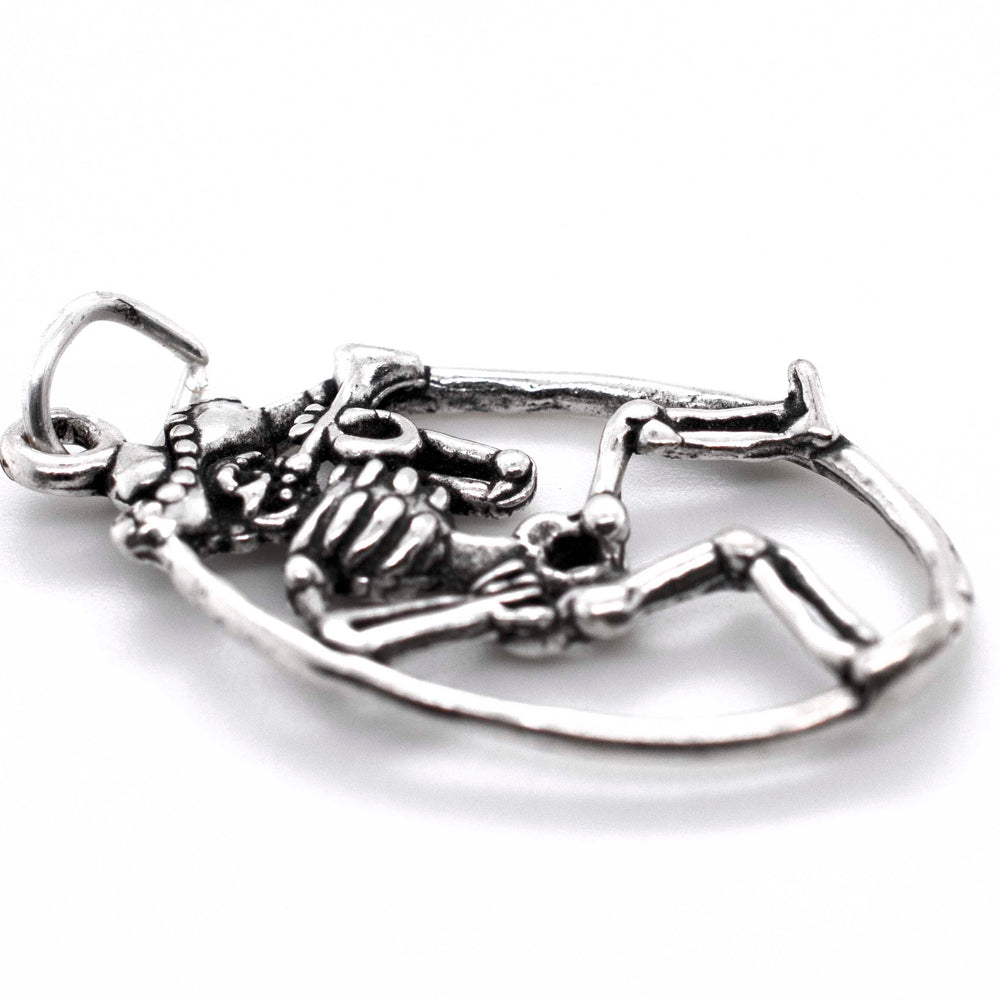 
                  
                    A Mariachi Skeleton with Horn pendant from Super Silver, on a white background, perfect for a Día De Los Muertos or charm bracelet accessory.
                  
                