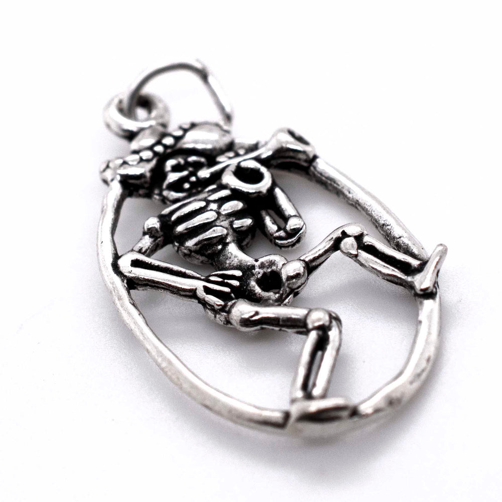 A Super Silver Mariachi Skeleton with Horn Pendant on a white background.