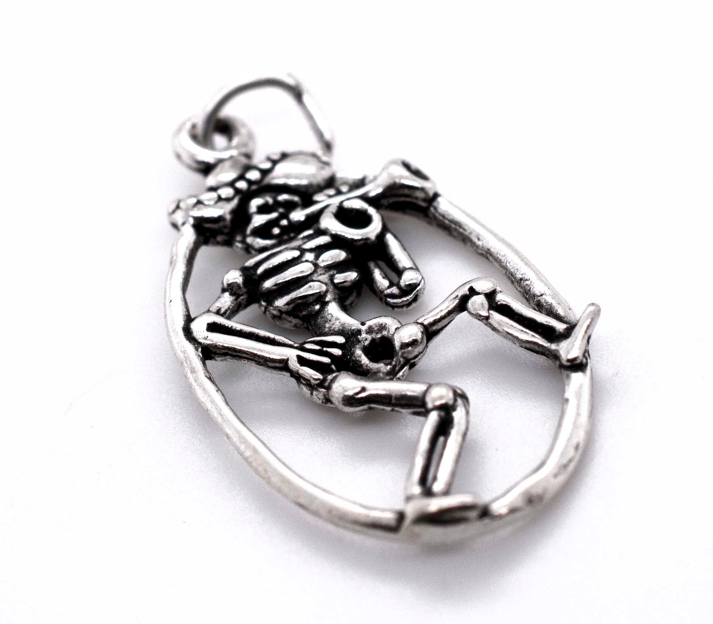A Super Silver Mariachi Skeleton with Horn Pendant on a white background.