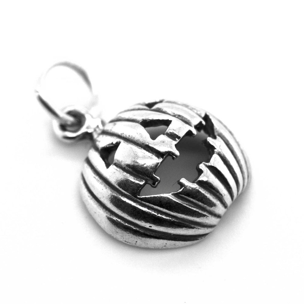 
                  
                    Description: A silver pendant with a Grinning Jack O' Lantern Charm by Super Silver.
                  
                