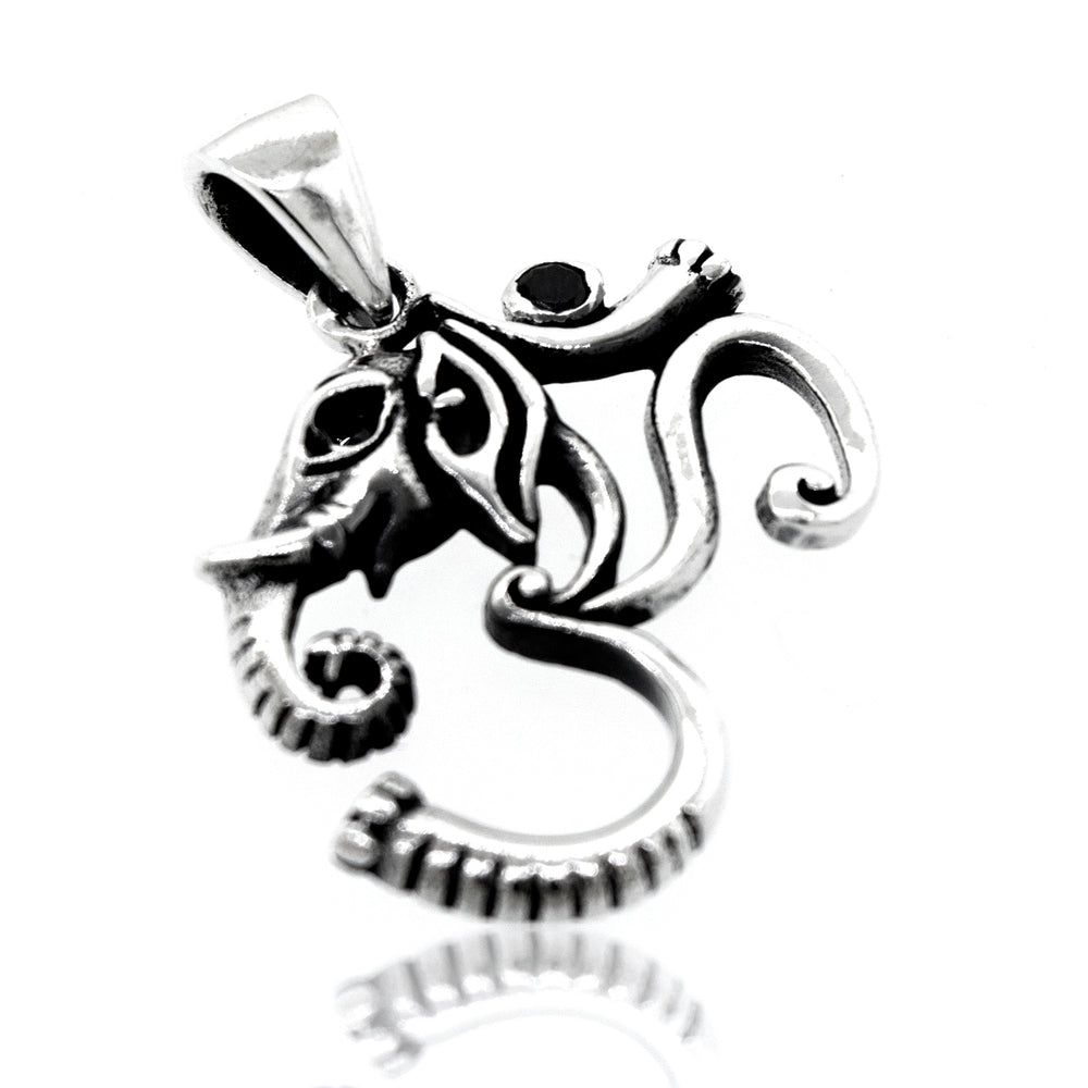 A Super Silver Om Pendant With Elephant Head Design.