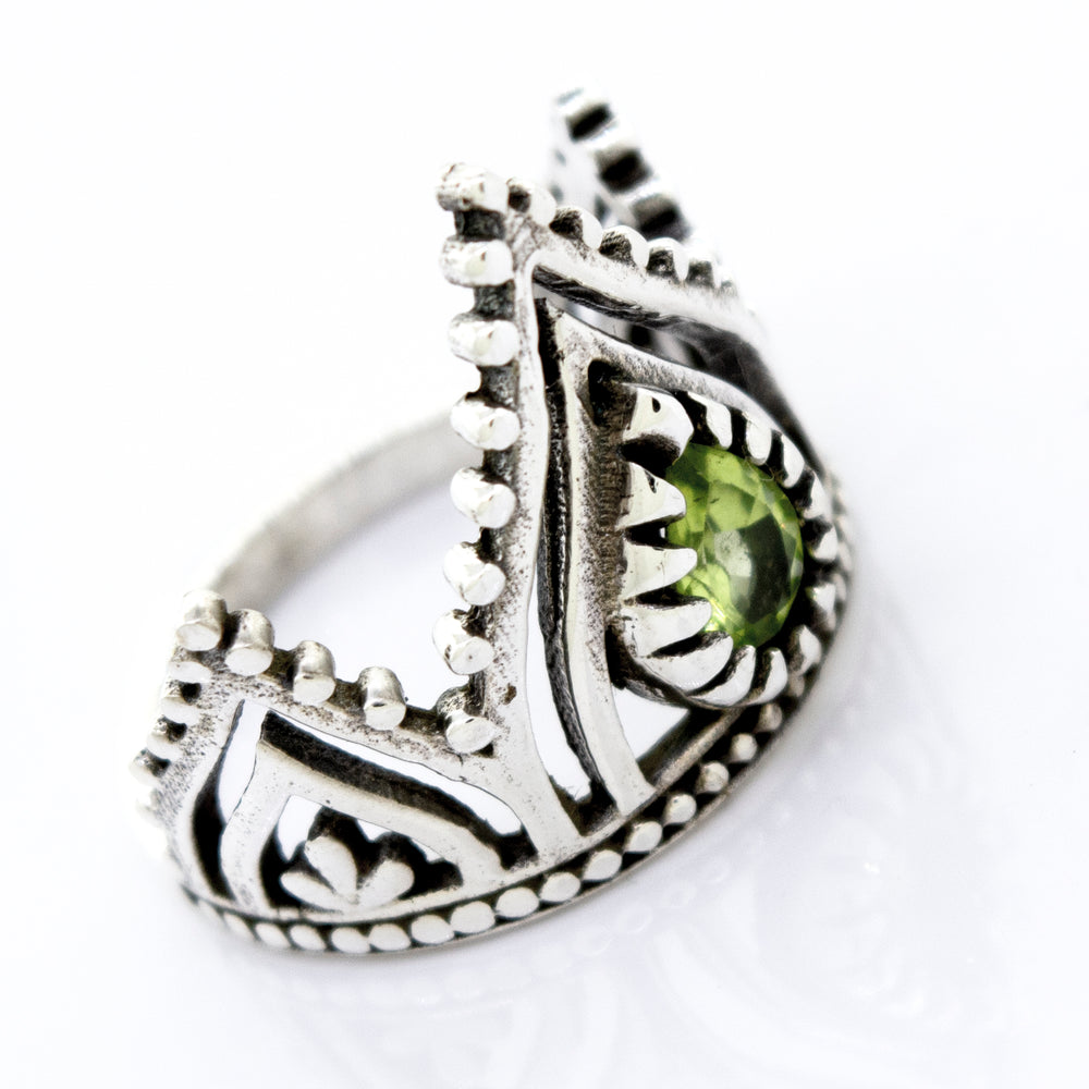 
                  
                    A Super Silver Crown Ring With Teardrop Shape Peridot.
                  
                