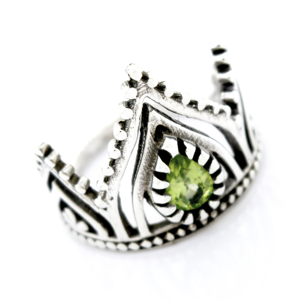 A Super Silver Crown Ring With Teardrop Shape Peridot.