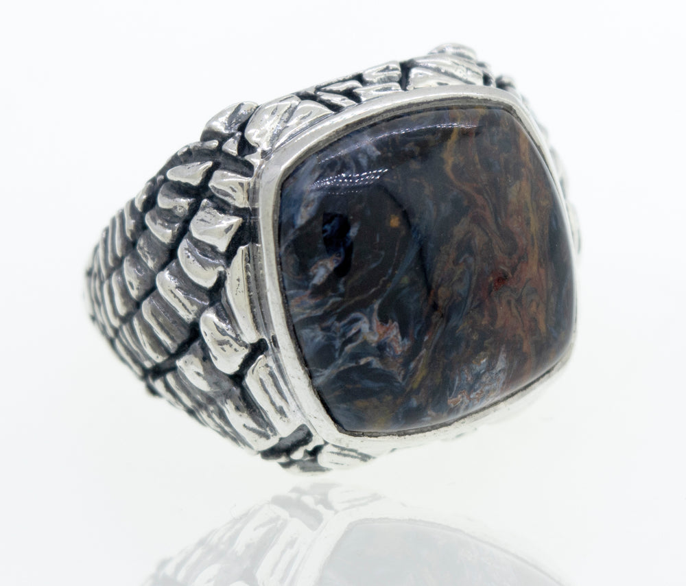 A Pietersite Signet Ring with a statement black stone.