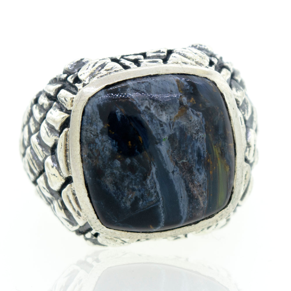 
                  
                    A Pietersite Signet Ring featuring a statement black stone.
                  
                