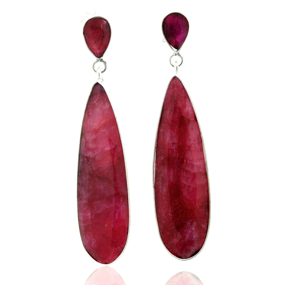 
                  
                    A pair of Super Silver Vibrant Teardrop Shape Ruby Earrings.
                  
                