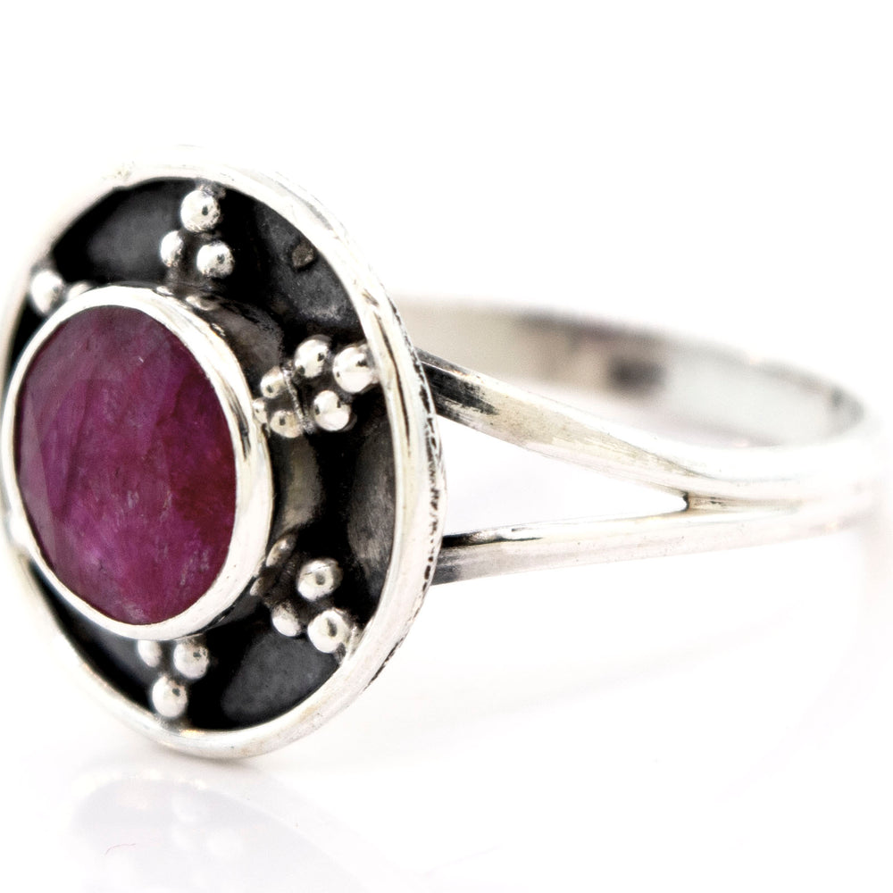
                  
                    A Super Silver Ruby Ring With Unique Oxidized Silver Design with a ruby stone in the center.
                  
                