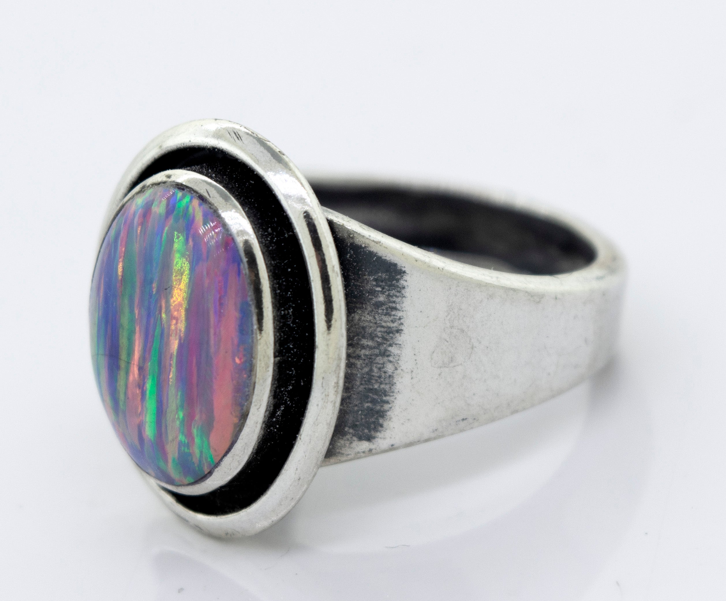 A minimalist Radiant Opal Signet Ring.