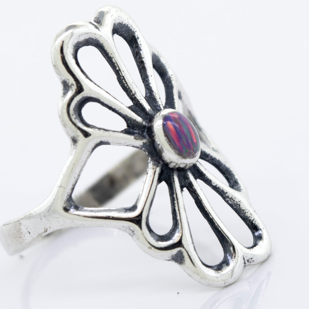 
                  
                    A Super Silver American Made Flower Ring with an oval opal stone.
                  
                