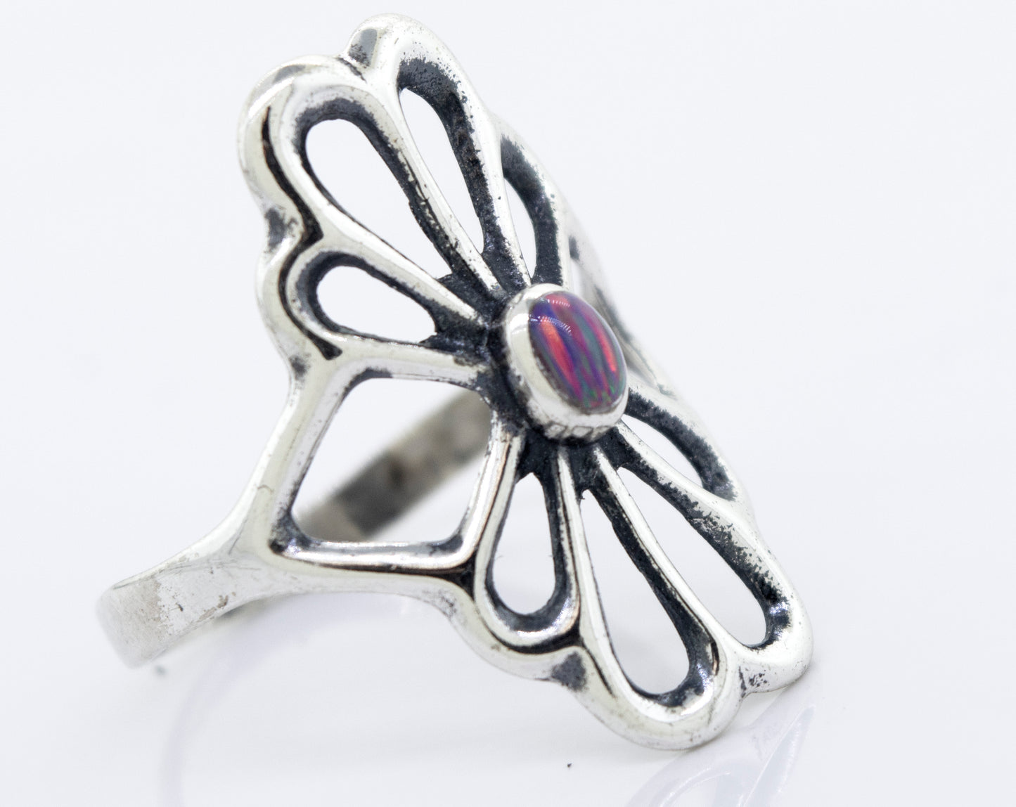 
                  
                    A Super Silver American Made Flower Ring with an oval opal stone.
                  
                