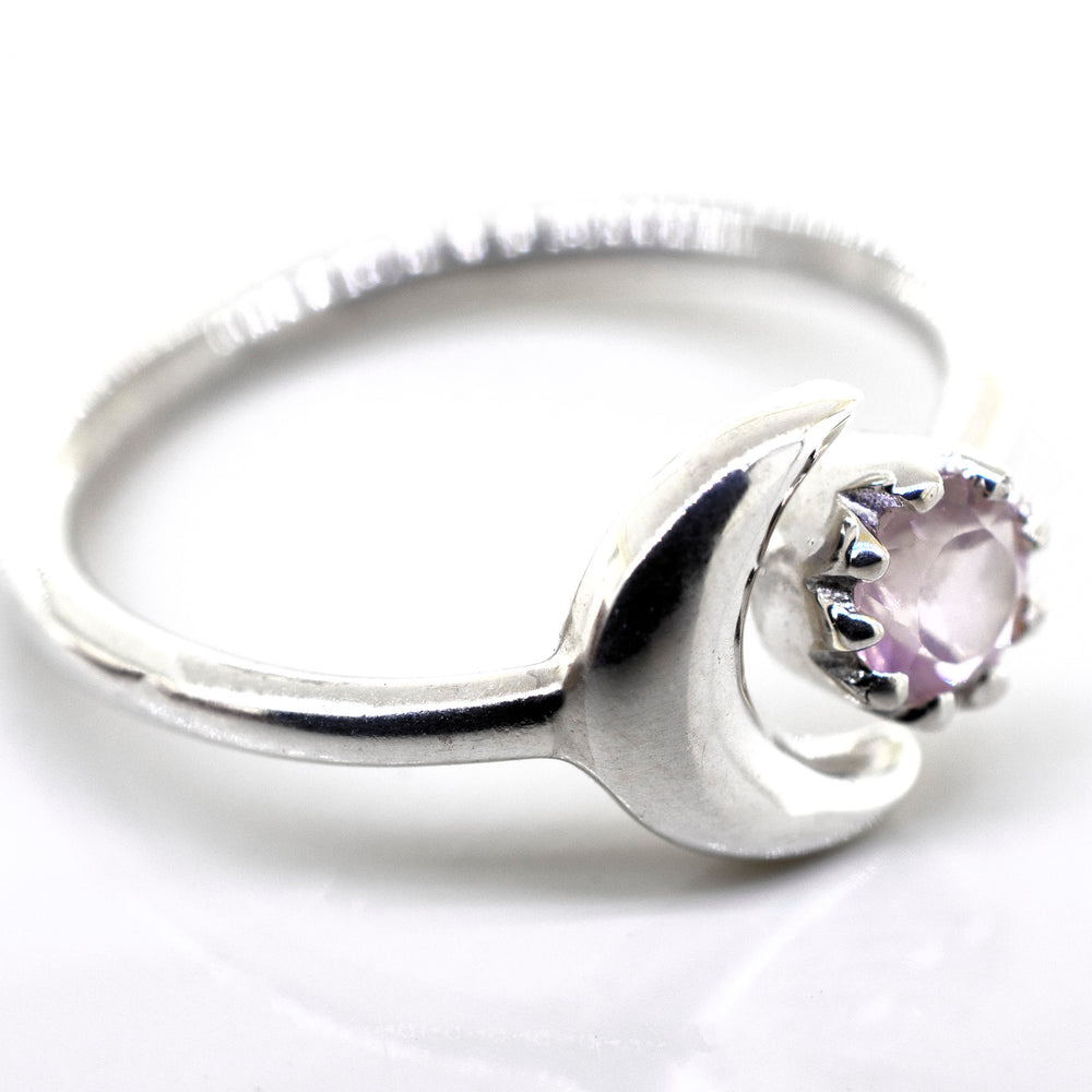 A Super Silver sterling silver ring with the Online Only Exclusive Rose Quartz Ring stone and a crescent moon.
