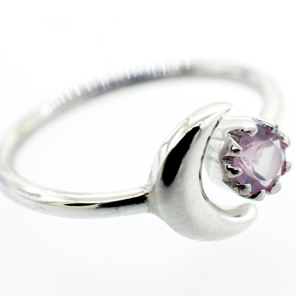
                  
                    A Super Silver sterling silver ring with a pink Online Only Exclusive Rose Quartz stone and a crescent moon.
                  
                