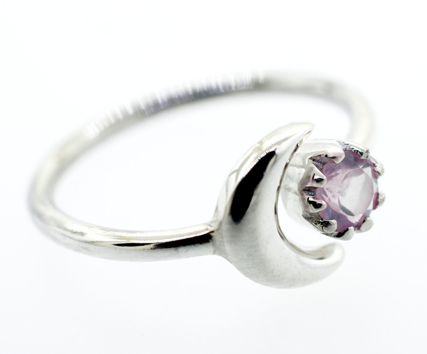 
                  
                    A Super Silver sterling silver ring with a pink Online Only Exclusive Rose Quartz stone and a crescent moon.
                  
                
