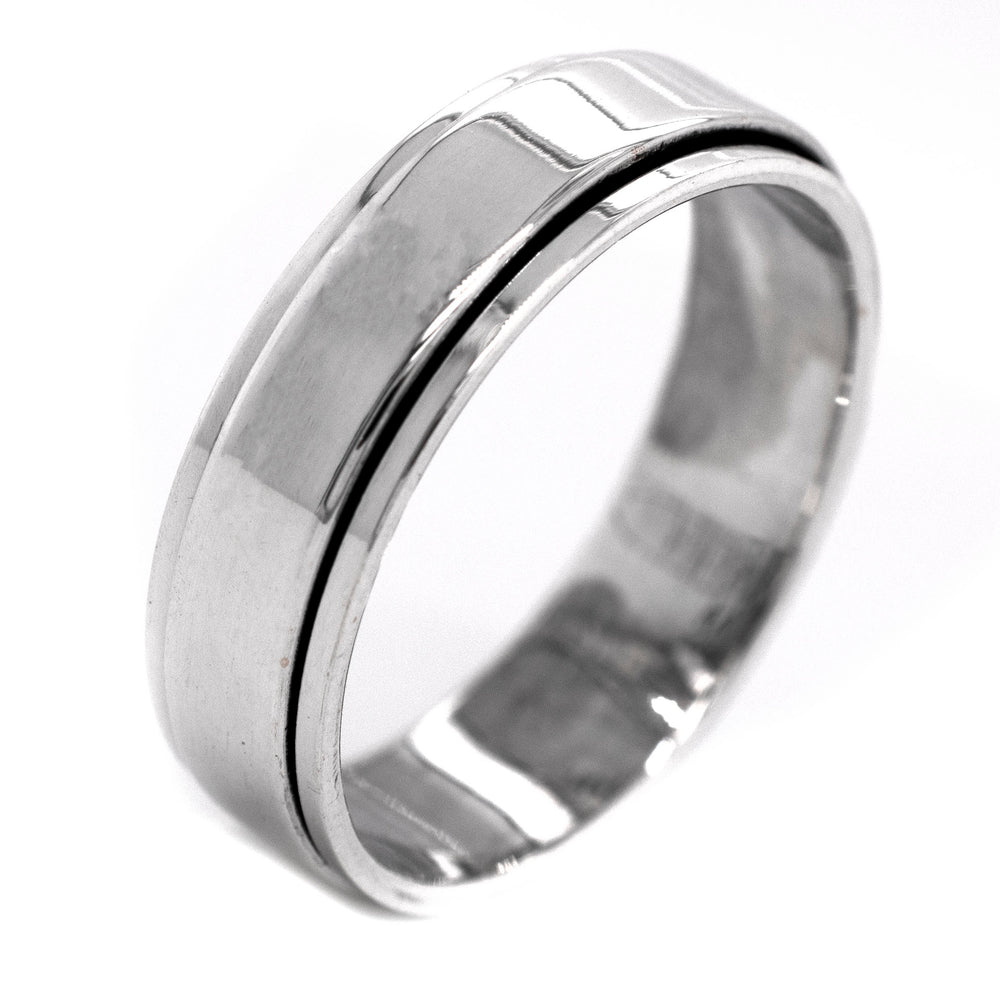 A Men's Silver Spinner Ring.