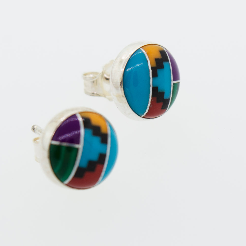 A pair of vibrant Super Silver Multi-Stone Round Stud Earrings on a white background featuring an American made, sterling silver frame.