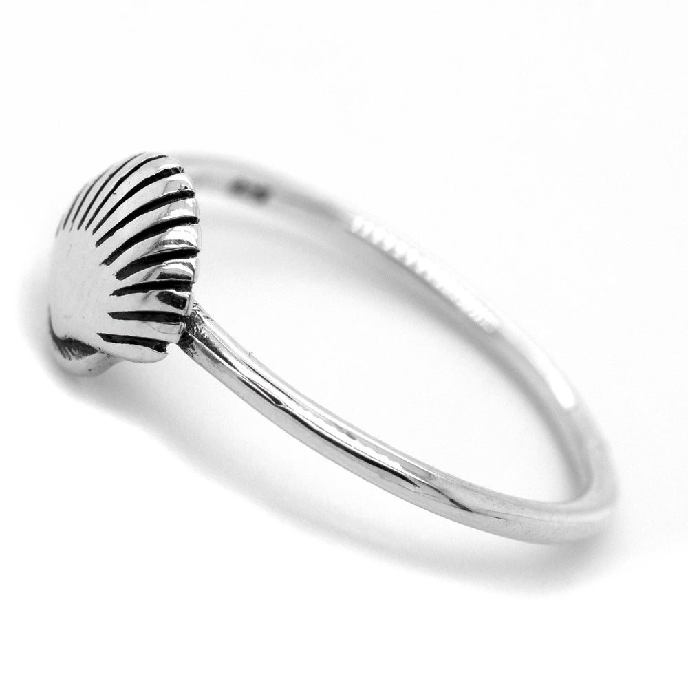 
                  
                    An ocean lover's dream come true - a Delicate Seashell Ring tastefully crafted in silver by Super Silver, perfect for storefront displays or personal adornment.
                  
                