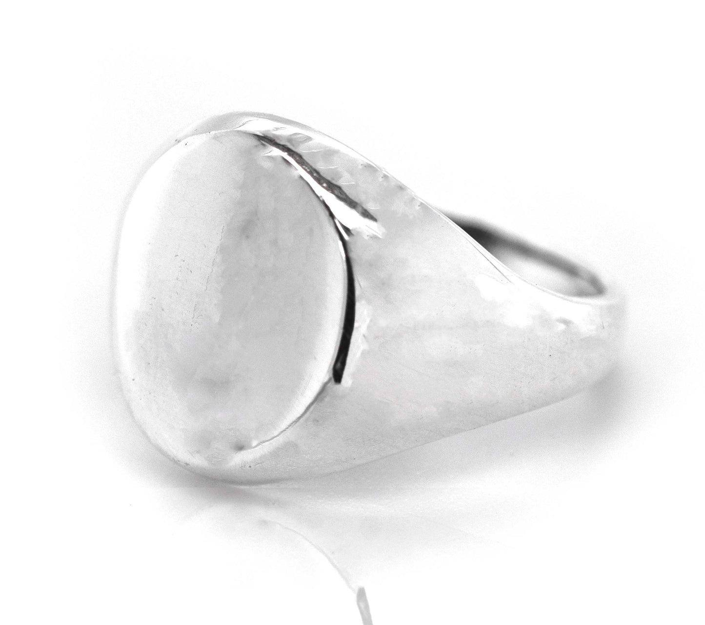 An engraved Super Silver oval signet ring, perfect for everyday wear, displayed on a white background.