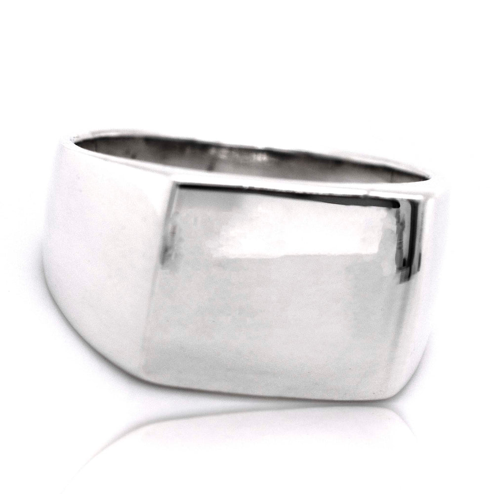 A Signet Ring with a square-shaped band, made of sterling silver.