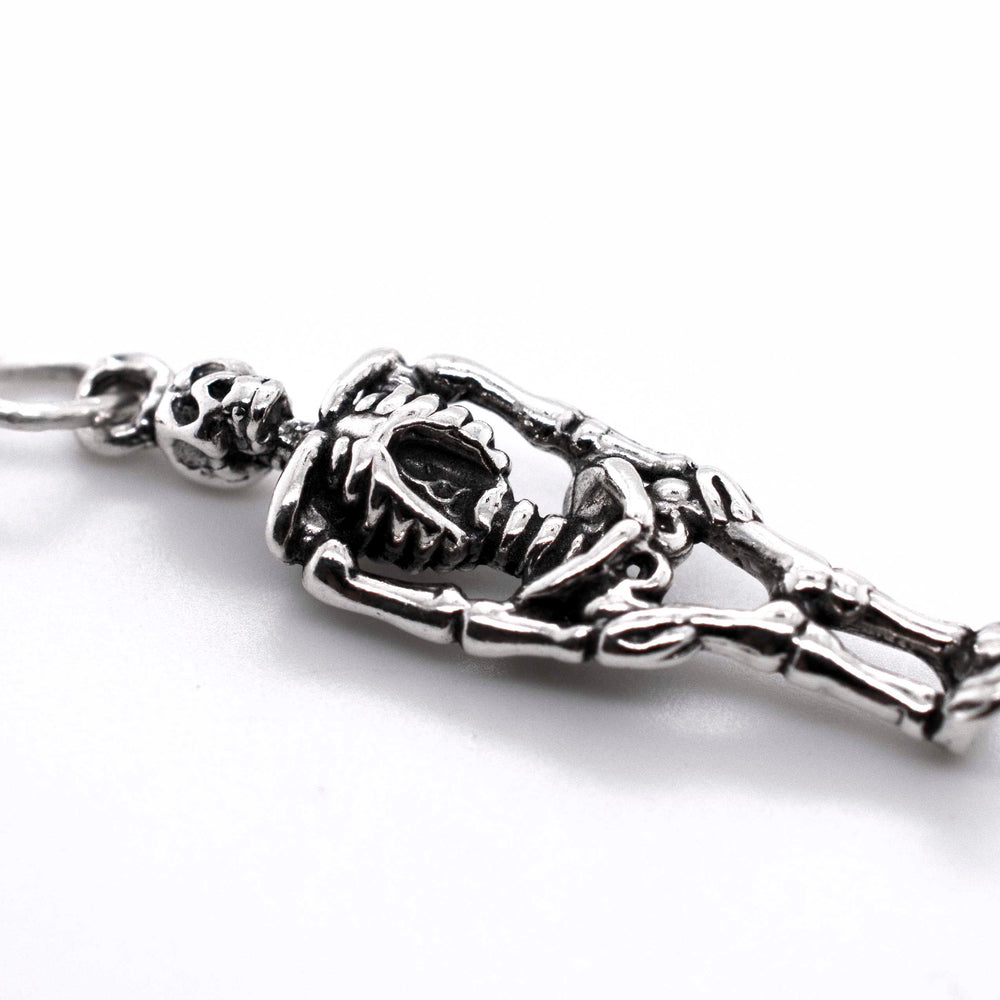 A Small Skeleton Charm by Super Silver on a white background.