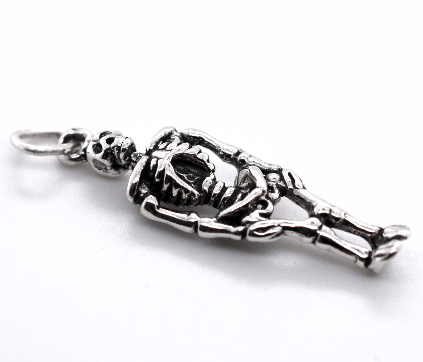 A Small Skeleton Charm by Super Silver on a white background.