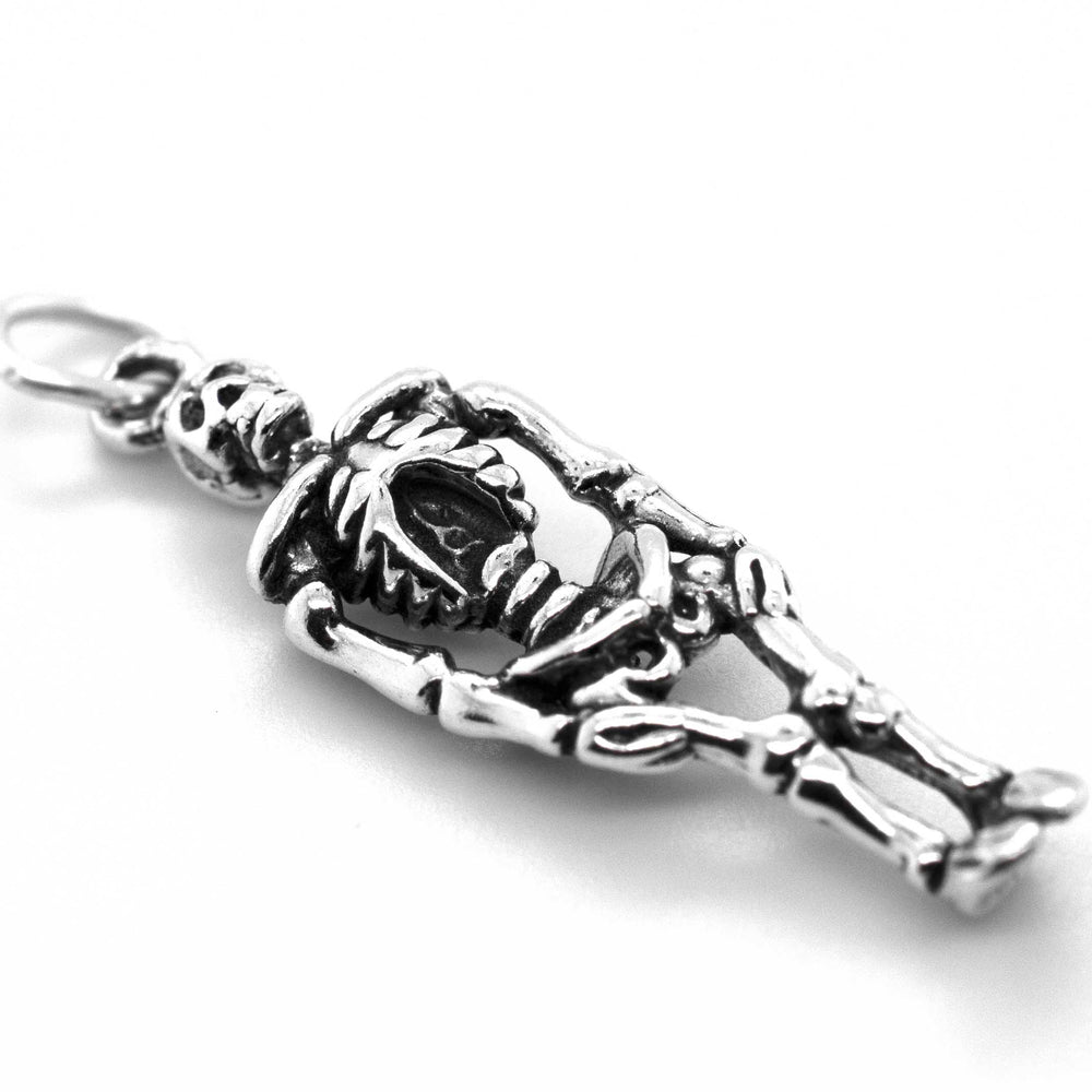 A Super Silver Small Skeleton Charm on a white background.