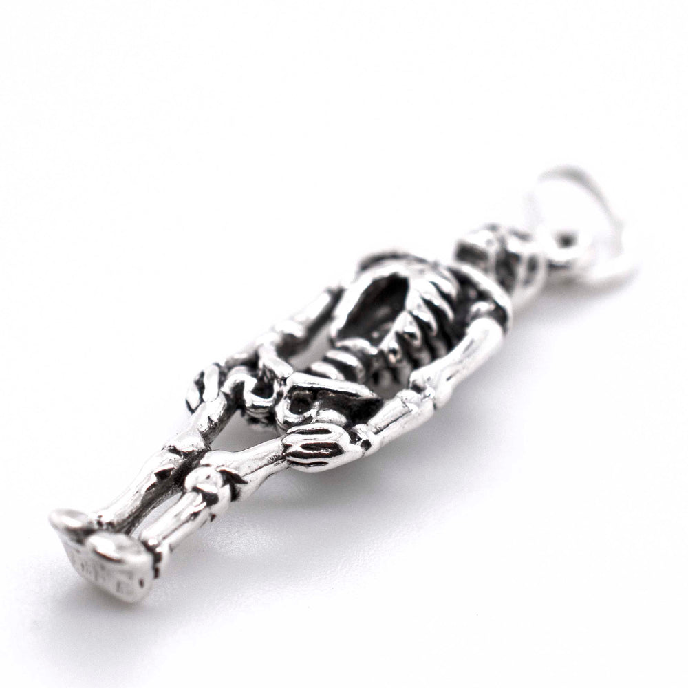 
                  
                    A Super Silver Small Skeleton Charm on a white background.
                  
                
