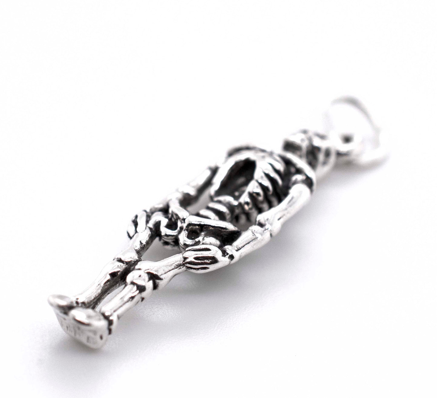 
                  
                    A Super Silver Small Skeleton Charm on a white background.
                  
                