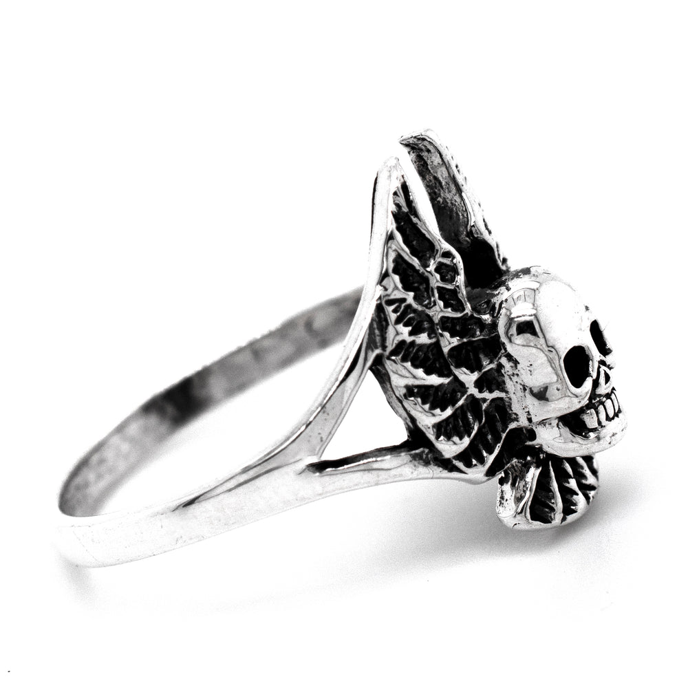 
                  
                    This gothic Skull Ring With Wings features a skull and wings design.
                  
                