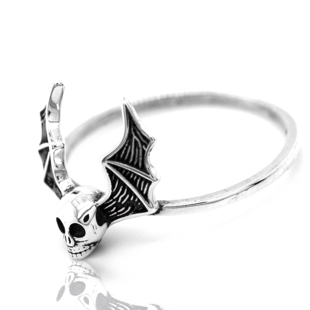 A gothic silver Skull Bat Ring featuring a bat.