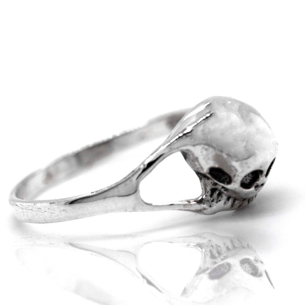 
                  
                    A mens Dainty Skull Ring with a skull on it.
                  
                