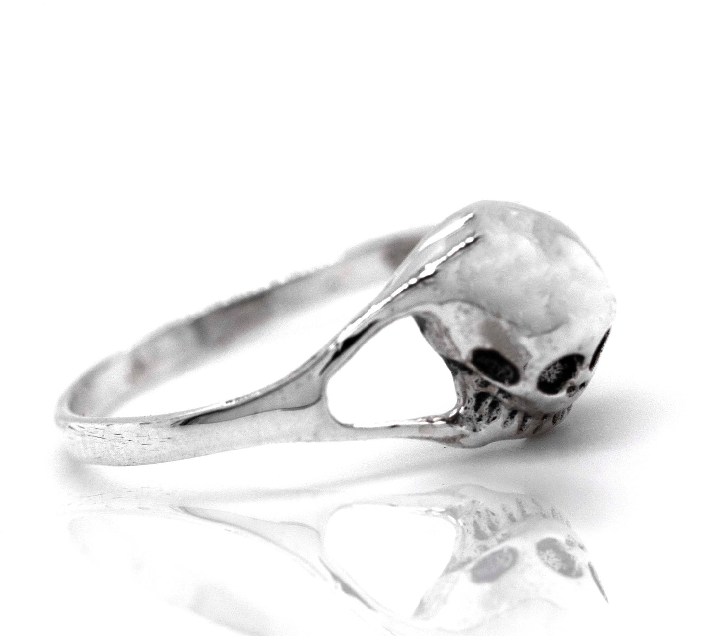 
                  
                    A mens Dainty Skull Ring with a skull on it.
                  
                